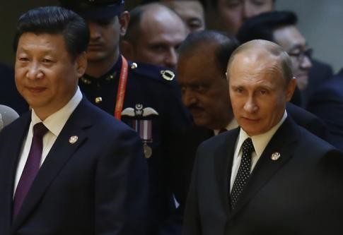 Russes et Chinois établissent un partenariat à part entière - ảnh 1